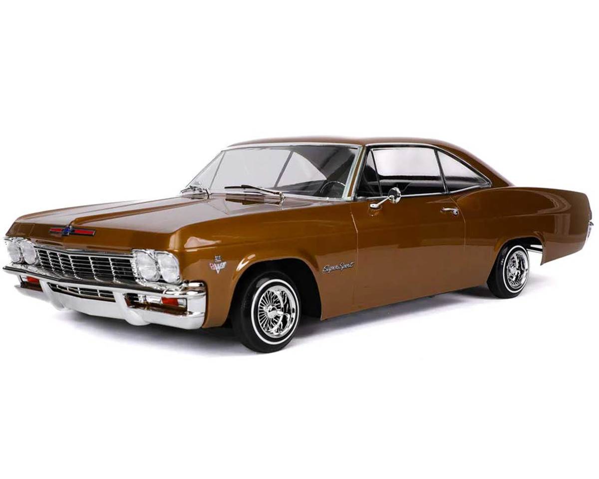 Redcat SixtyFive Chevrolet Impala 1/10 RTR Scale Hopping Lowrider (Rootbeer) W/2.4GHz Radio, Battery & Charger 4 Redcat SixtyFive Chevrolet Impala 1/10 RTR Scale Hopping Lowrider (Rootbeer) W/2.4GHz Radio, Battery & Charger - Image 2