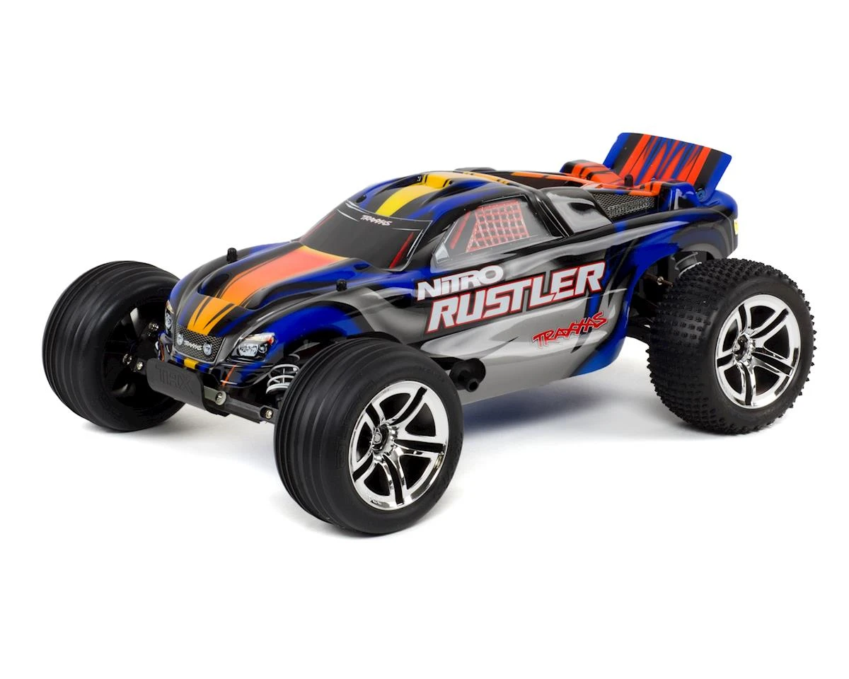 Traxxas Nitro Rustler 1/10 RTR Stadium Truck (Red) W/TQi 2.4GHz, TSM, EZ Start, Battery & DC Charger 4 Traxxas Nitro Rustler 1/10 RTR Stadium Truck (Red) W/TQi 2.4GHz, TSM, EZ Start, Battery & DC Charger - Image 2